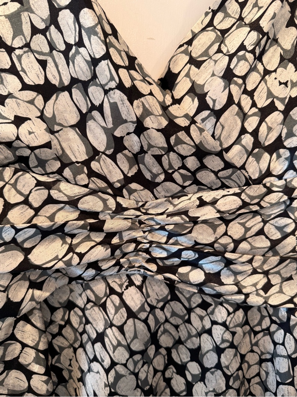 Black and ivory sleeveless fit-and-flare dress with an abstract pebble print. - Picture 2 of 5